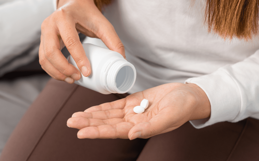 woman taking the abortion pill